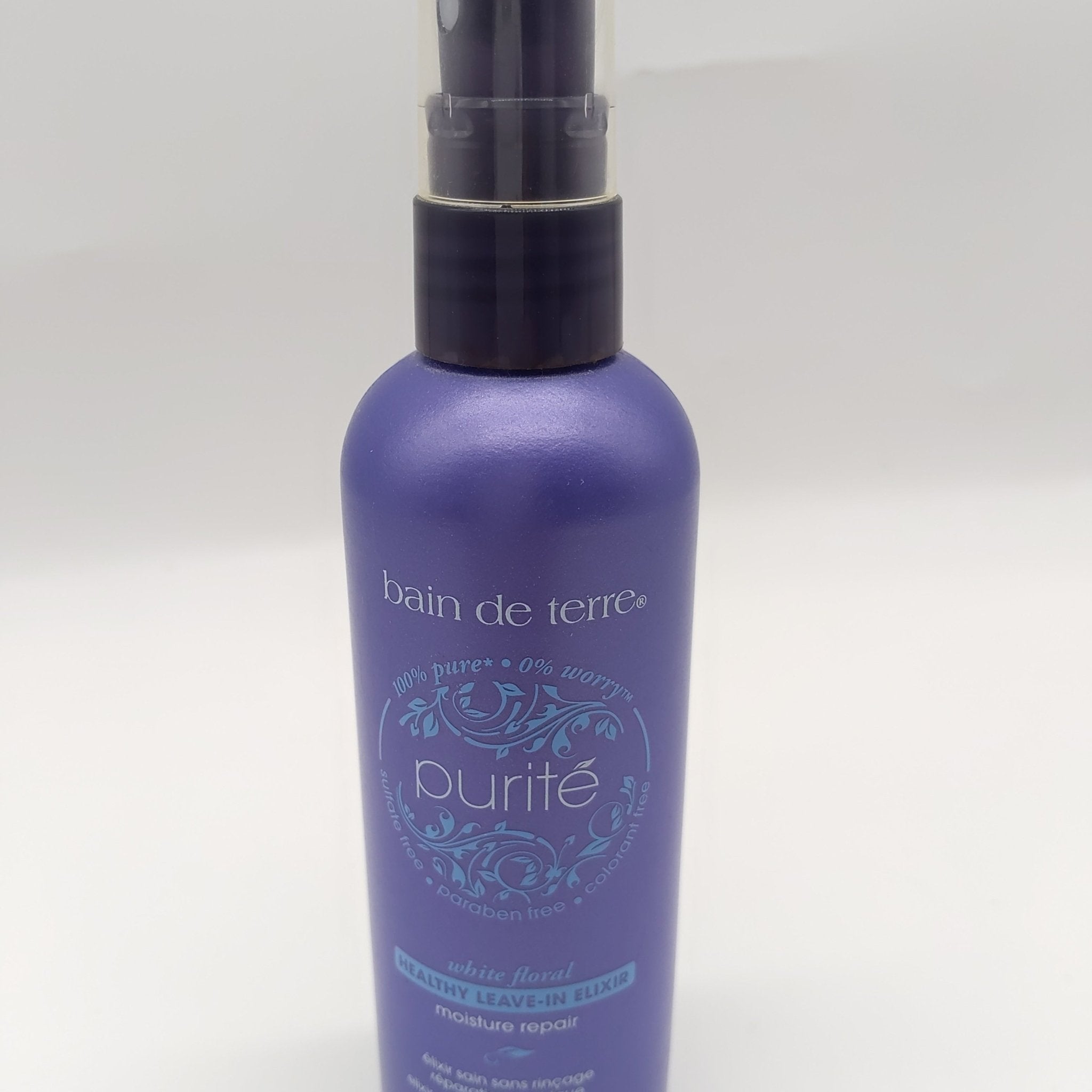 Bain de Terre Purite Healthy Moisture Repair Leave-In Elixir 4.2 fl oz bottle in purple packaging