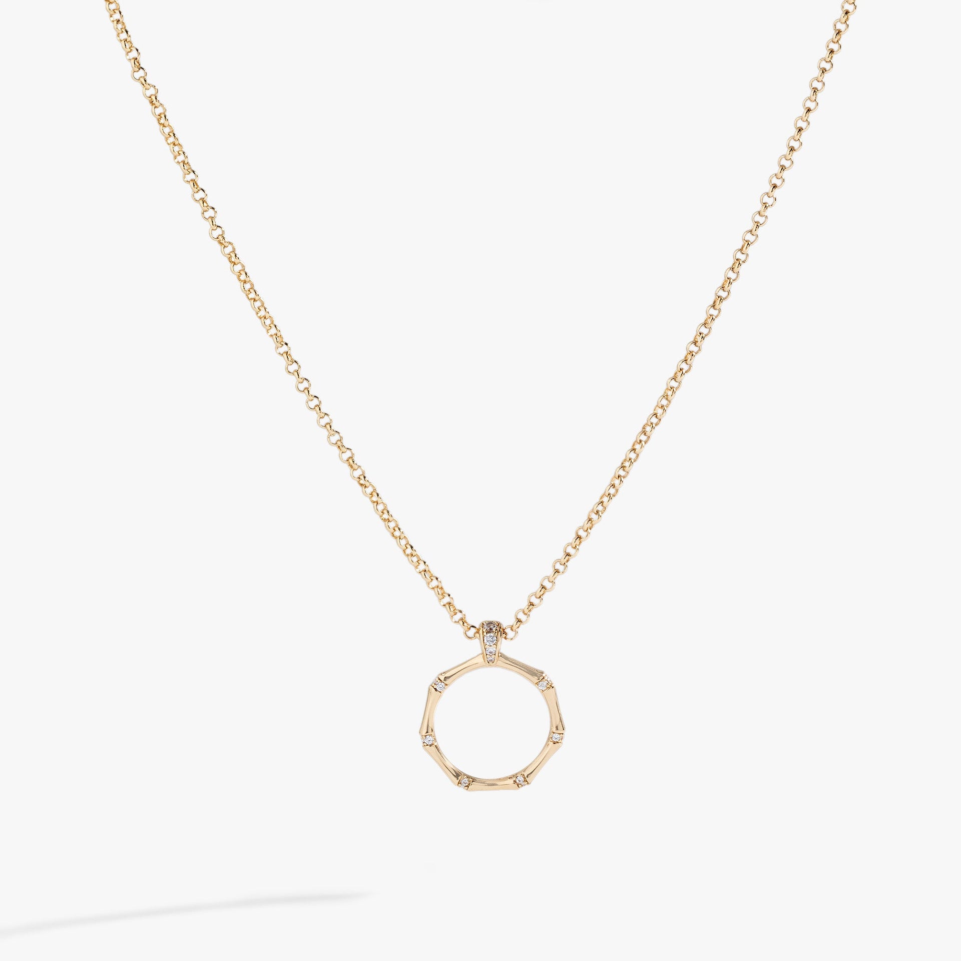 Shiny gold bamboo ring pendant necklace with pave crystal details