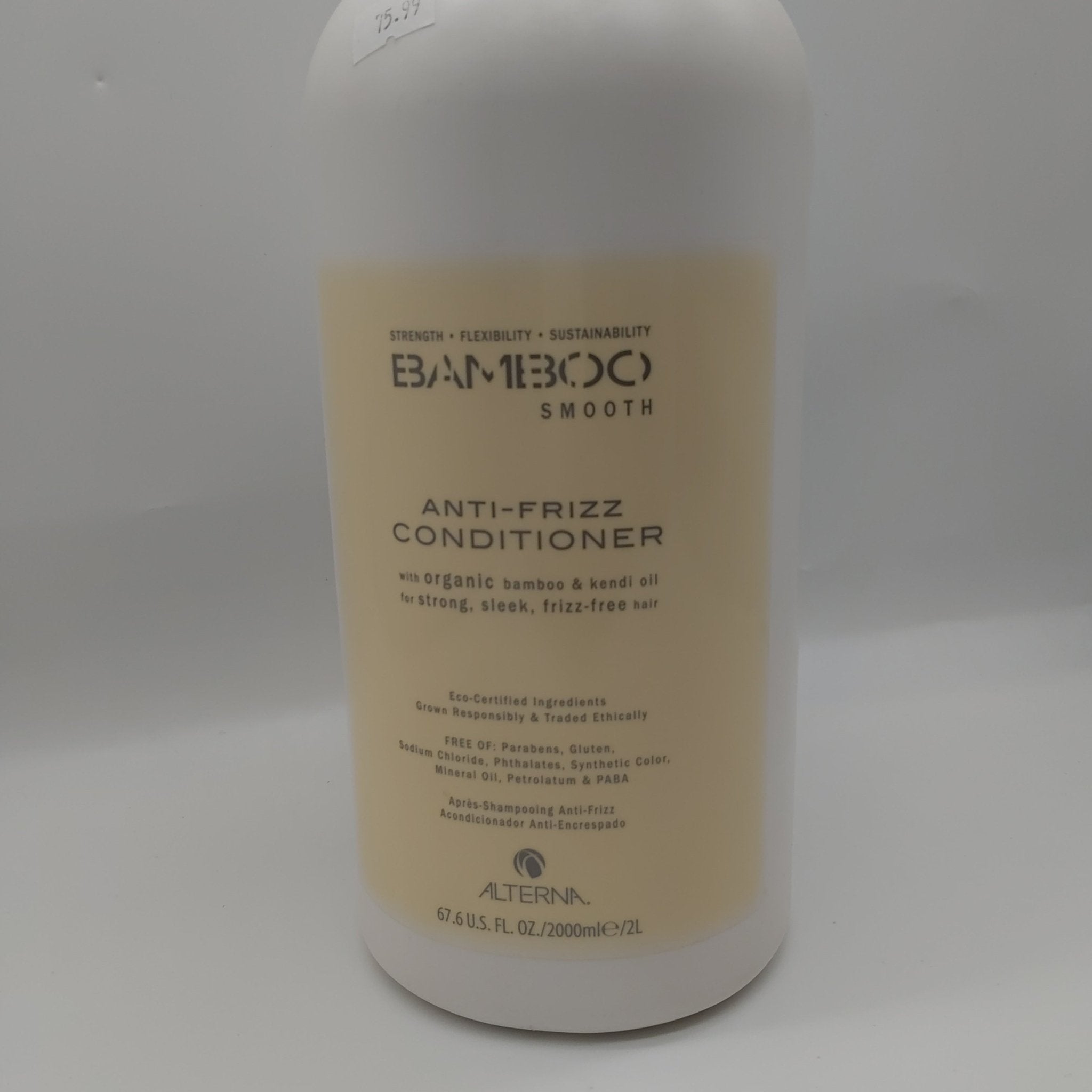 Large 2-liter bottle of Alterna Bamboo Smooth Anti-Frizz Conditioner in a white and cream color palette