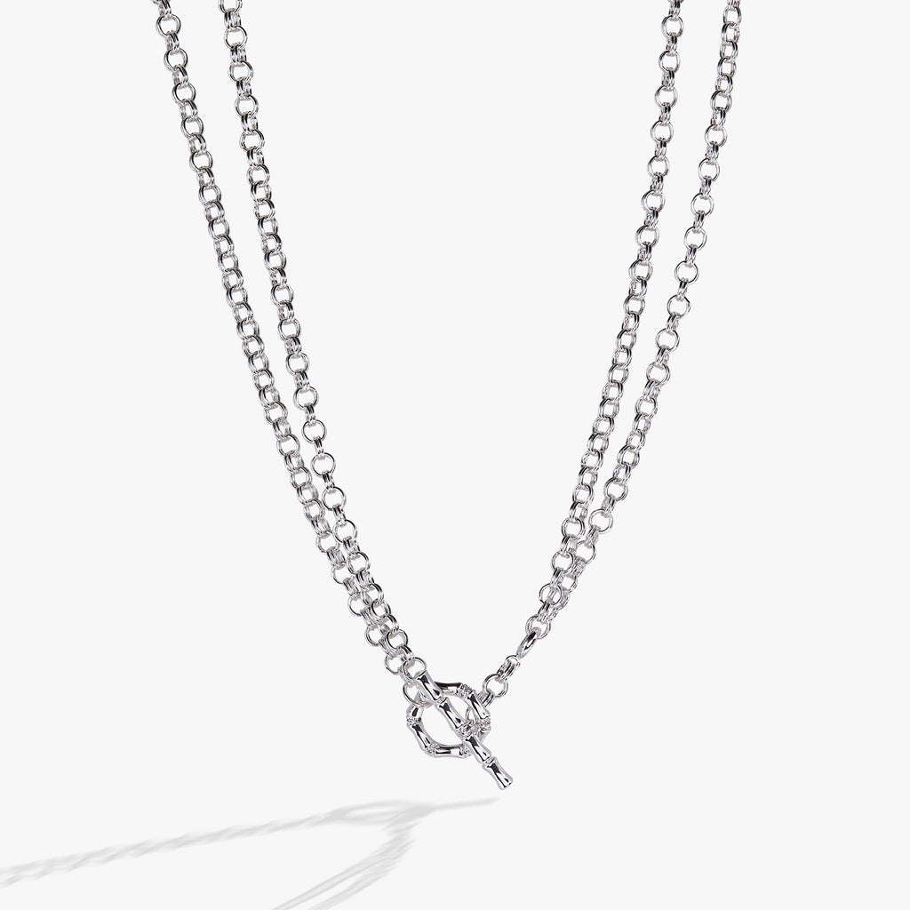 Convertible gold and silver bamboo-themed necklace and bracelet with pave crystals