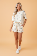 Oversized t-shirt featuring a mallard duck print paired with matching elastic drawstring shorts.