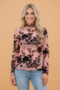 Retro floral print long sleeve mesh blouse with serged edge details.