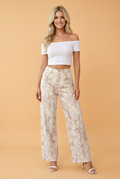 High-rise women's wide leg denim jeans in a neutral beige and taupe camo print