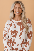 Abstract Cow Drop Shoulder Long Sleeve Sweater