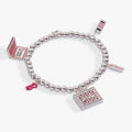 Barbie Girlboss stretch bracelet with pink enamel logo, laptop charm, and girlboss lettering.