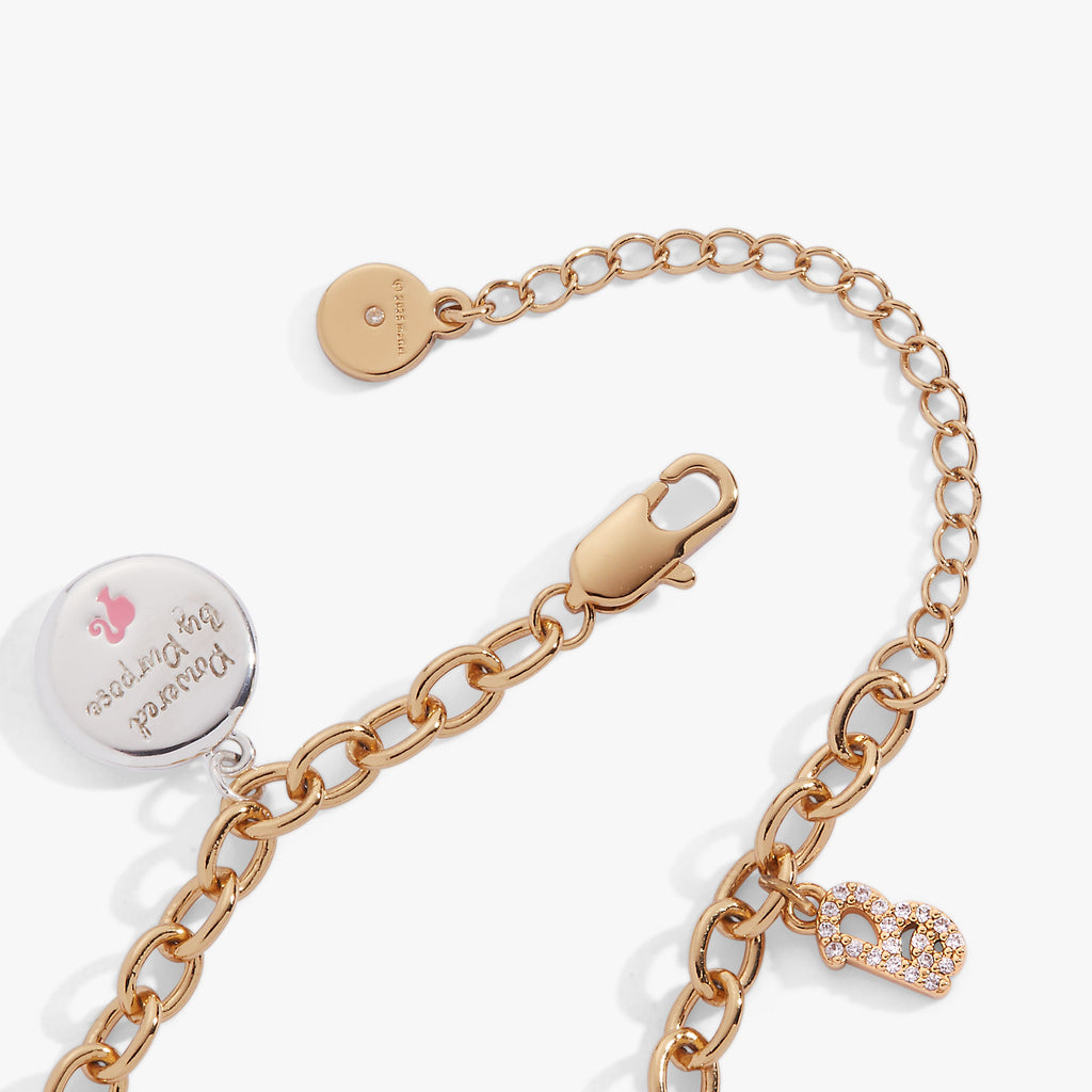Barbie™ Legal Charm Bracelet in Gold, Pink and Silver Finish