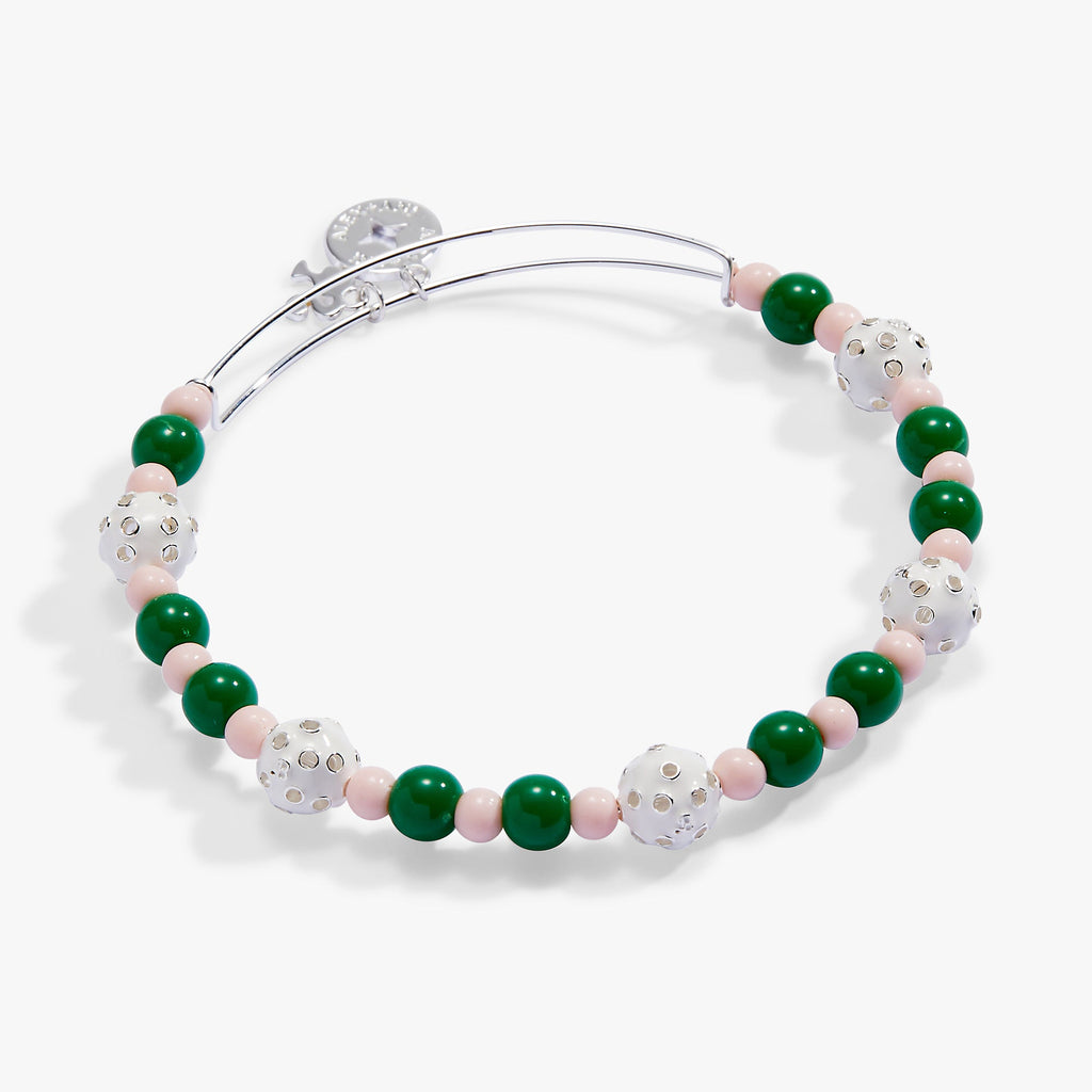 Barbie™ Pickleball beaded charm bangle with green, pink, and white enamel charms on a silver wire base.