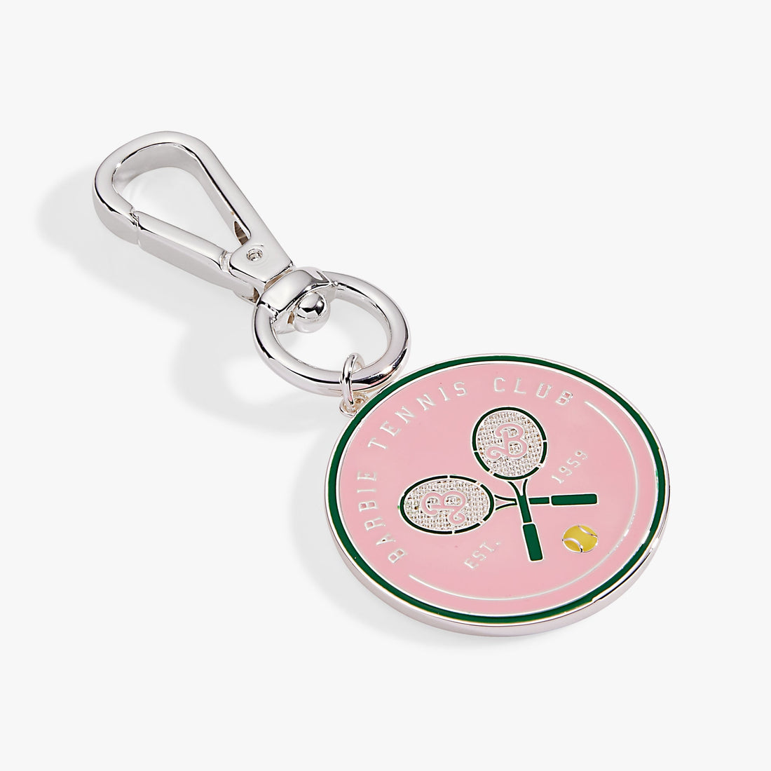 Barbie™ tennis bag charm featuring miniature tennis racquets in pink and green enamel with silver hardware.