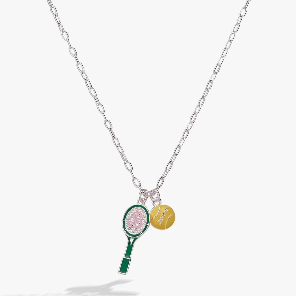 Barbie™ themed tennis necklace featuring a colorful enamel tennis racket and yellow tennis ball charm
