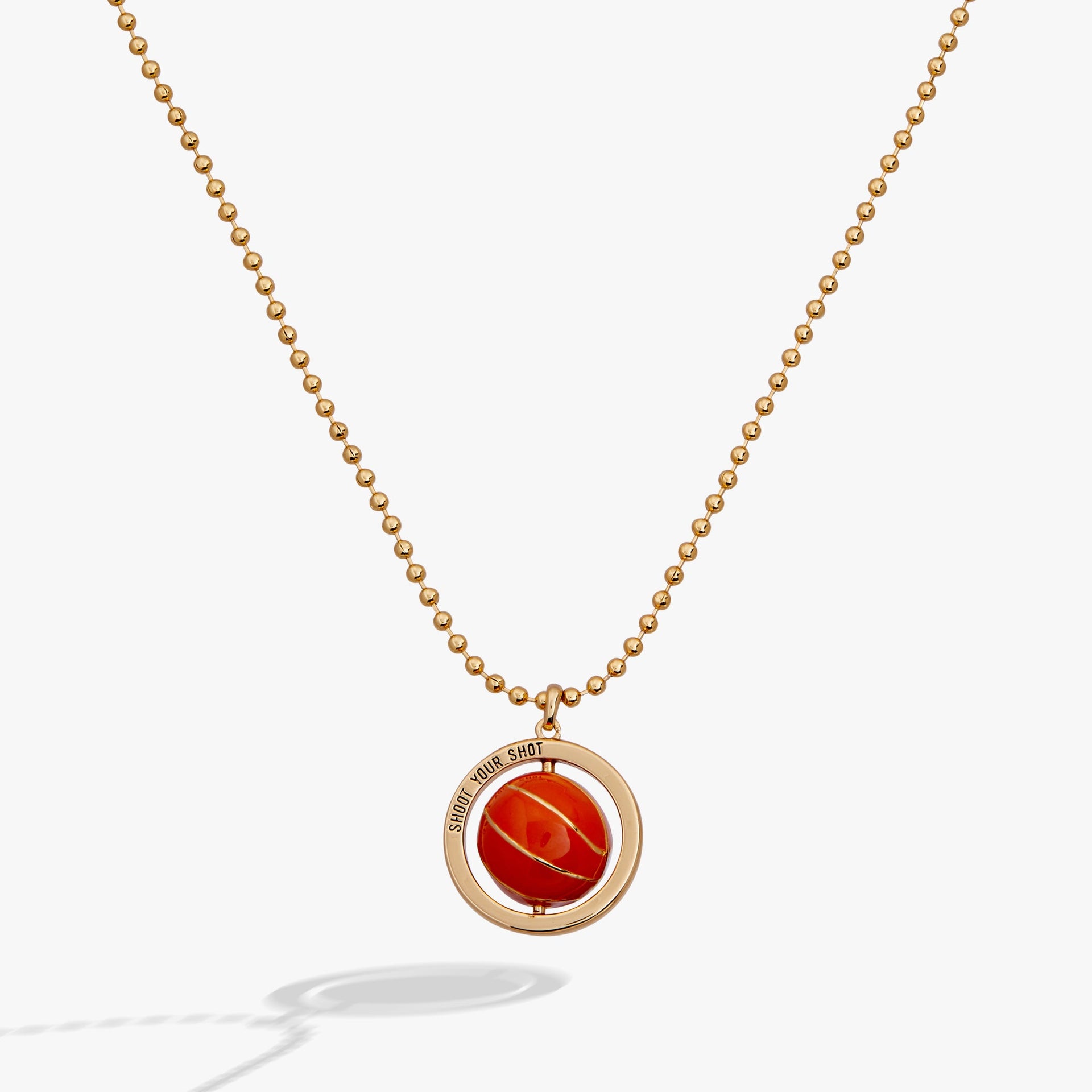 Gold and orange basketball spinner pendant featuring 'SHOOT YOUR SHOT' engraving on the rim.