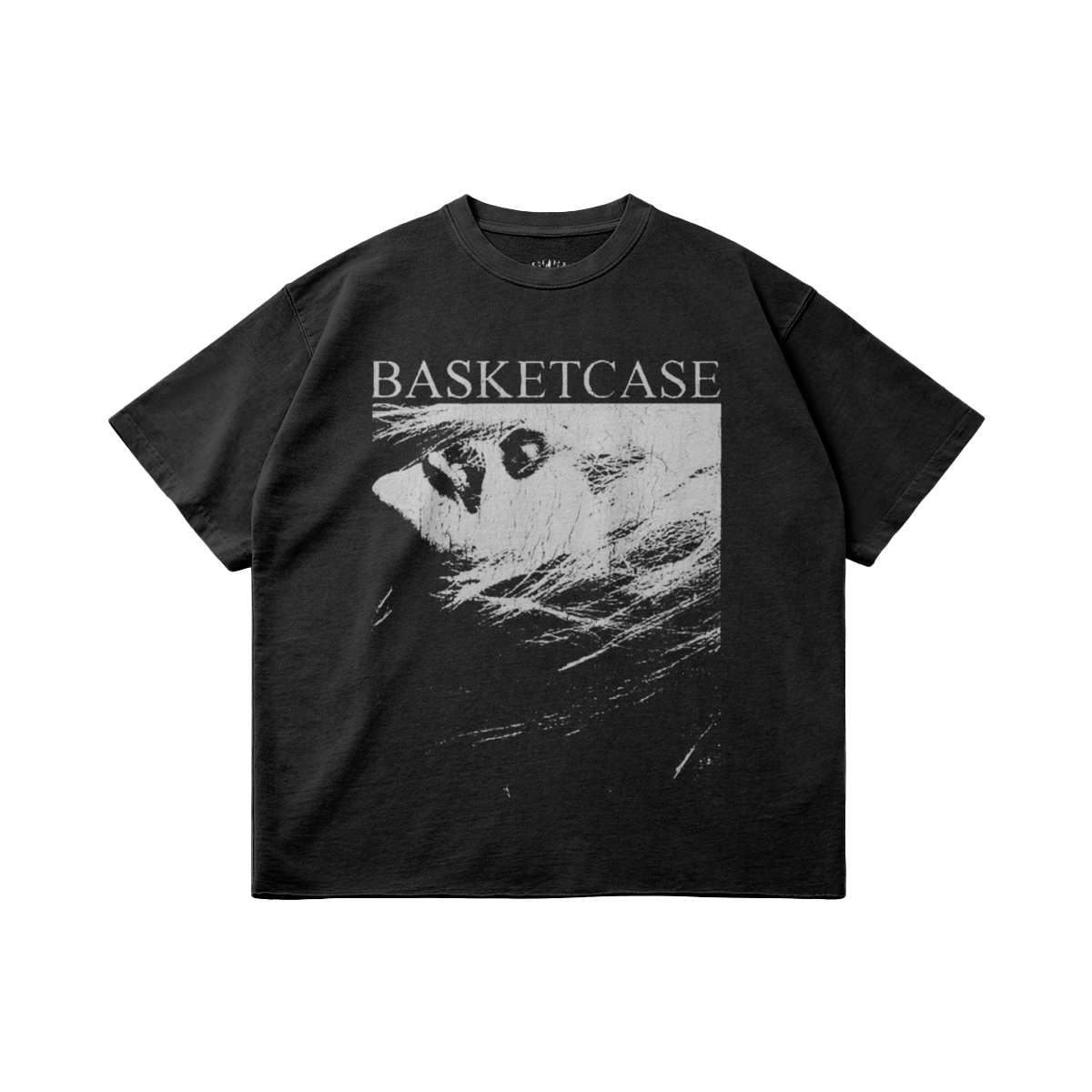 Front and back view of a black garment-dyed T-shirt with a Basketcase graphic print and raw hem detail