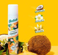 Batiste Tropical Dry Shampoo Exotic Coconut 120g spray can with tropical yellow and white packaging.