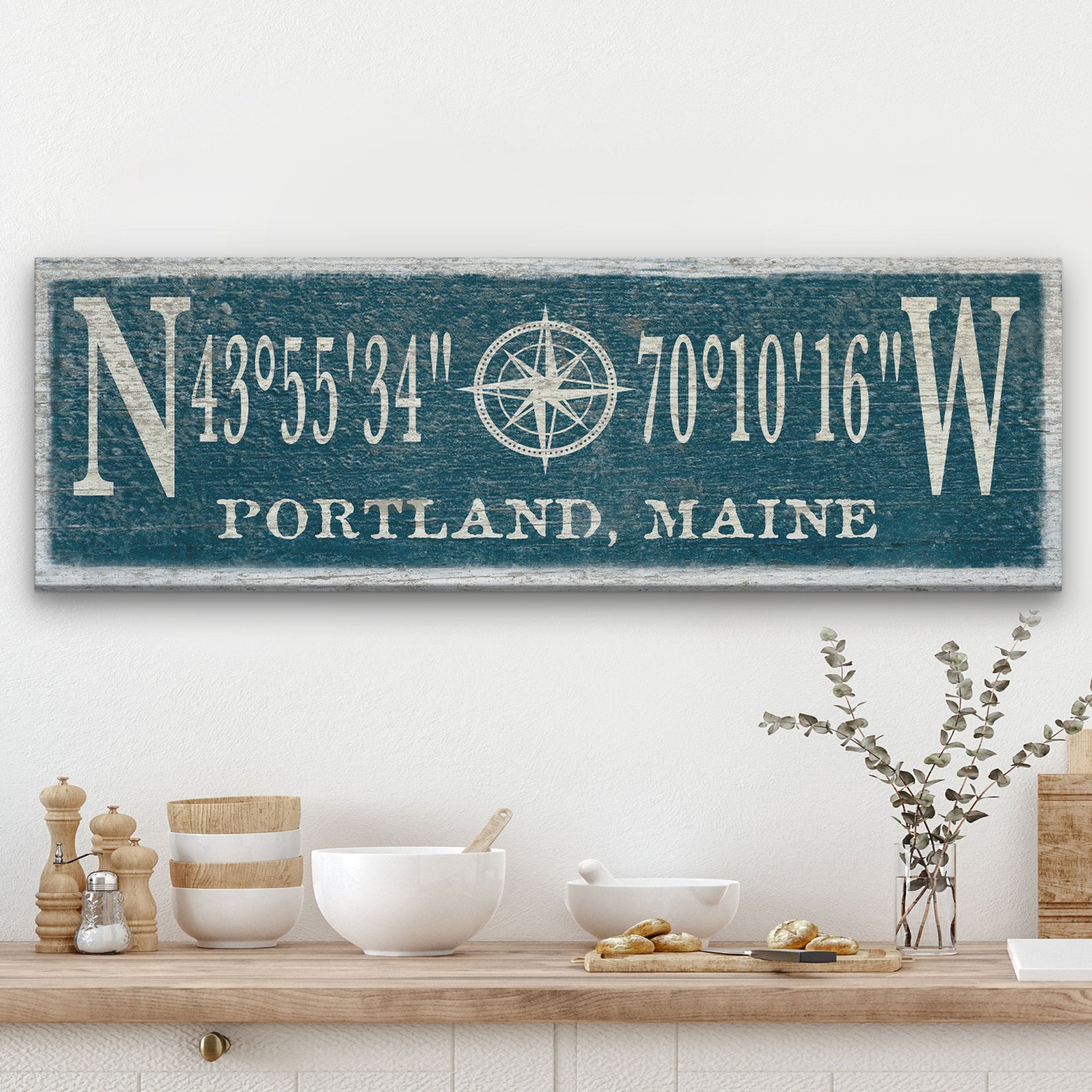 Personalized canvas sign featuring a distressed compass rose and custom GPS coordinates