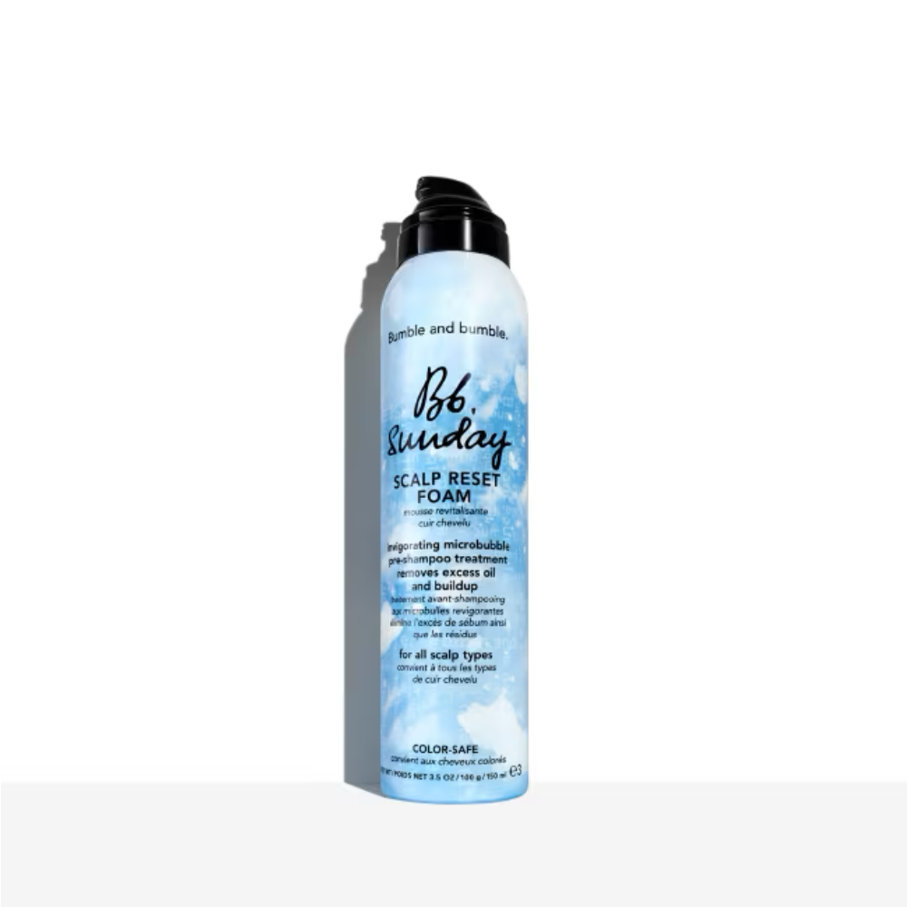 Bumble and bumble Sunday Scalp Reset Foam pump bottle in sky blue and white packaging.