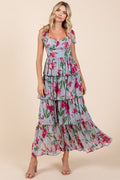 Elegant layered floral maxi dress with a feminine sweetheart neckline.