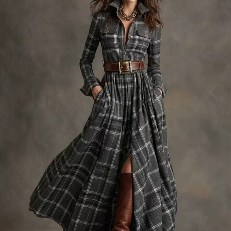 A woman wearing a long sleeve button-front plaid maxi shirt dress with pockets.