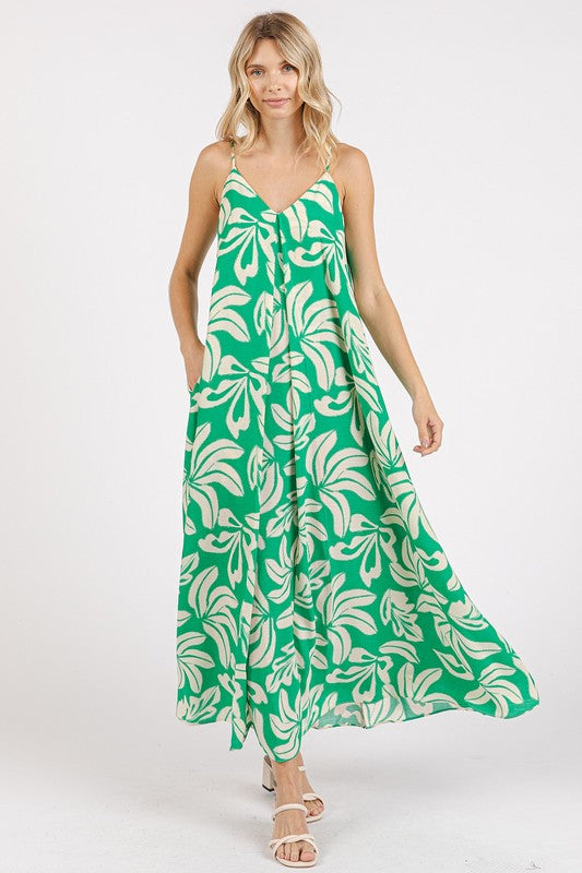 Printed V-Neck Maxi Cami Dress with ruched detail and pockets in a flowing, elegant silhouette.