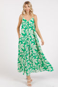 Printed V-Neck Maxi Cami Dress with ruched detail and pockets in a flowing, elegant silhouette.
