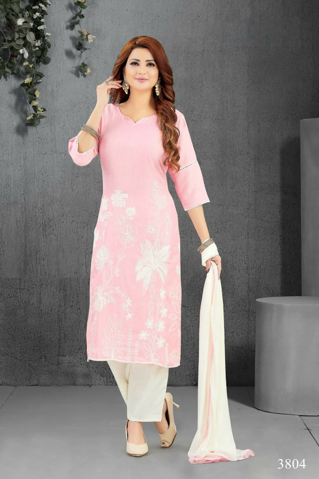 Vibrant pink lilan cotton kurta paired with cream bottom and dupatta
