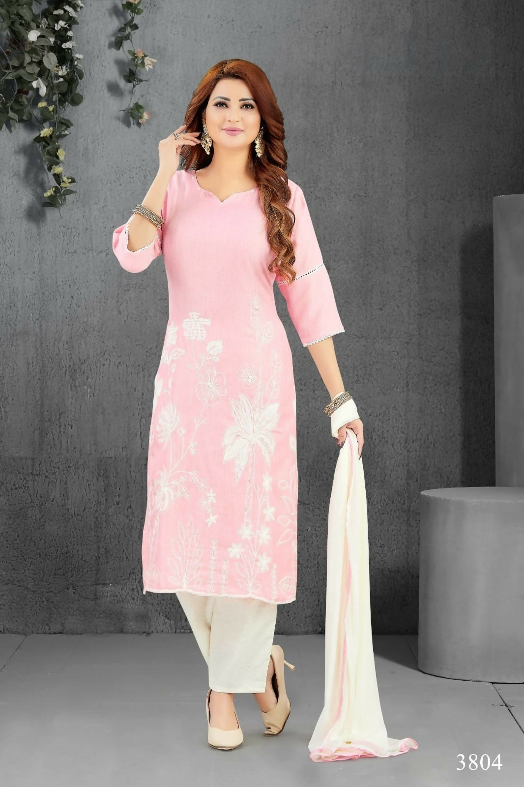 Vibrant pink lilan cotton kurta paired with cream bottom and dupatta