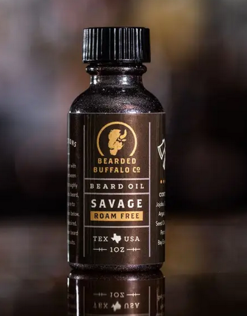 Bottle of Bearded Buffalo Beard Oil in Savage or Pioneer scent, featuring vibrant packaging.