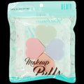 Set of 4 pastel-colored makeup sponges in mint, pink, lavender, and peach with a clear travel case.