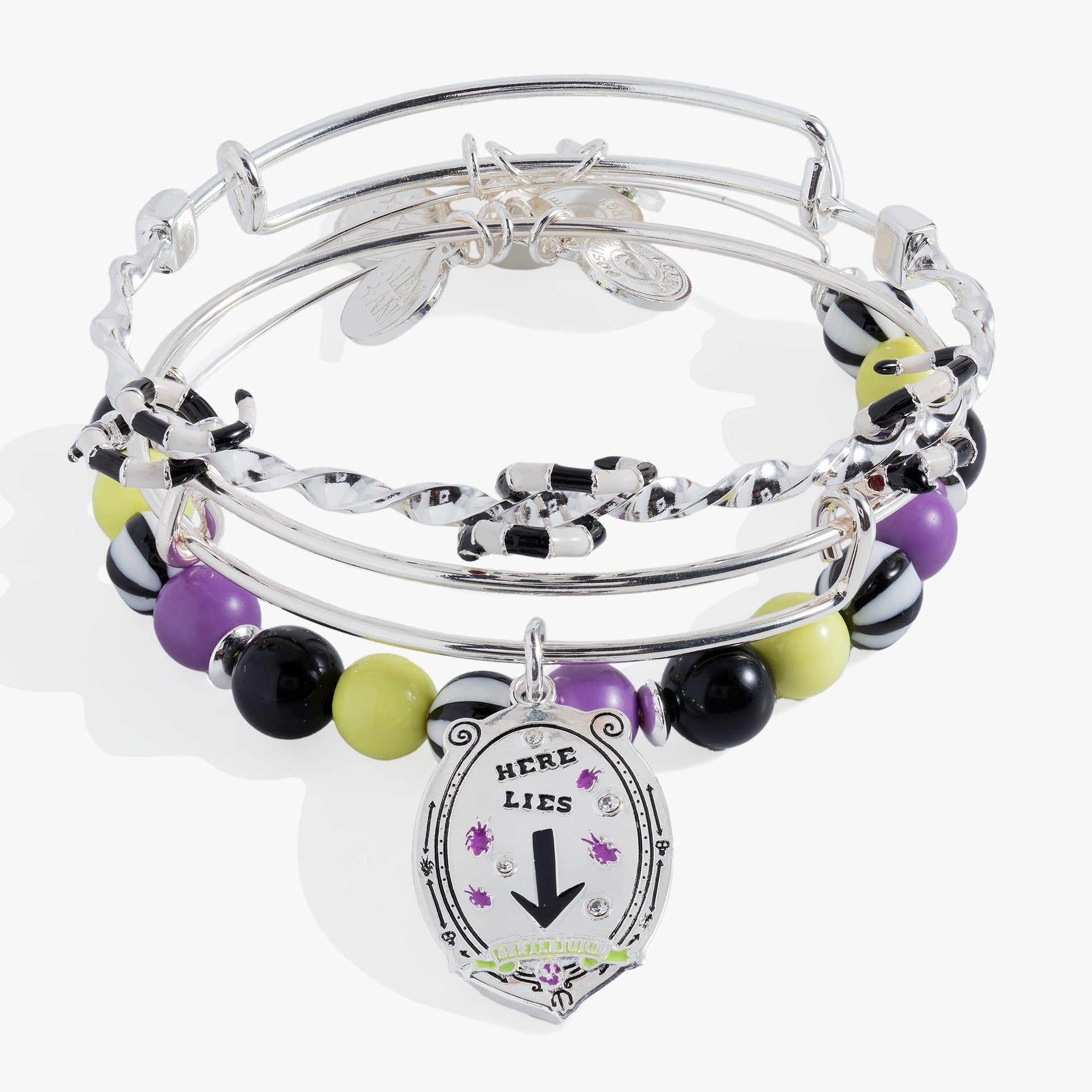 Set of three BEETLEJUICE™ bangles featuring striped beads and sandworm-themed silver chain details.