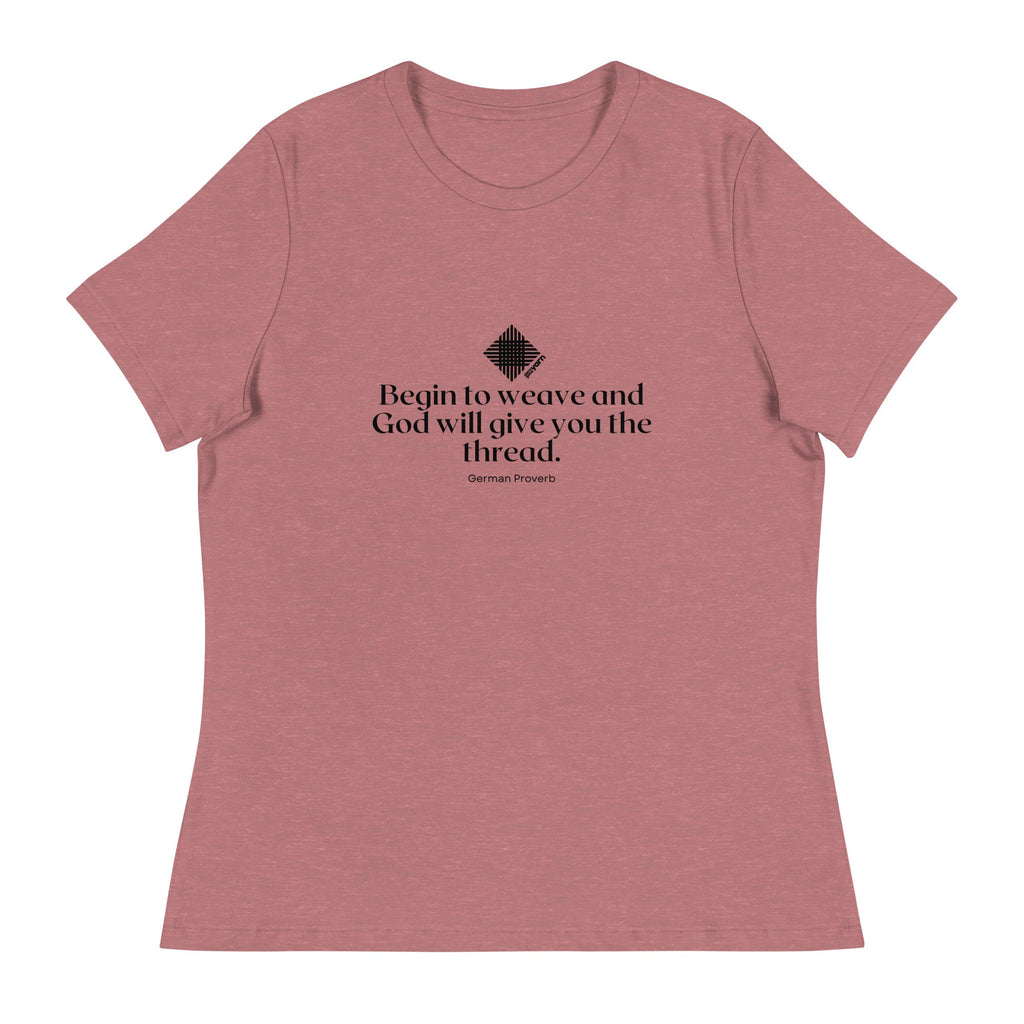 A woman wearing a relaxed fit, soft cotton crew neck T-shirt with the text Begin to weave and God will give you the thread.