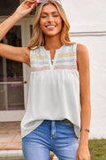 Rebekah Stitch white sleeveless shift top with smocked bust detailing and V-neck.