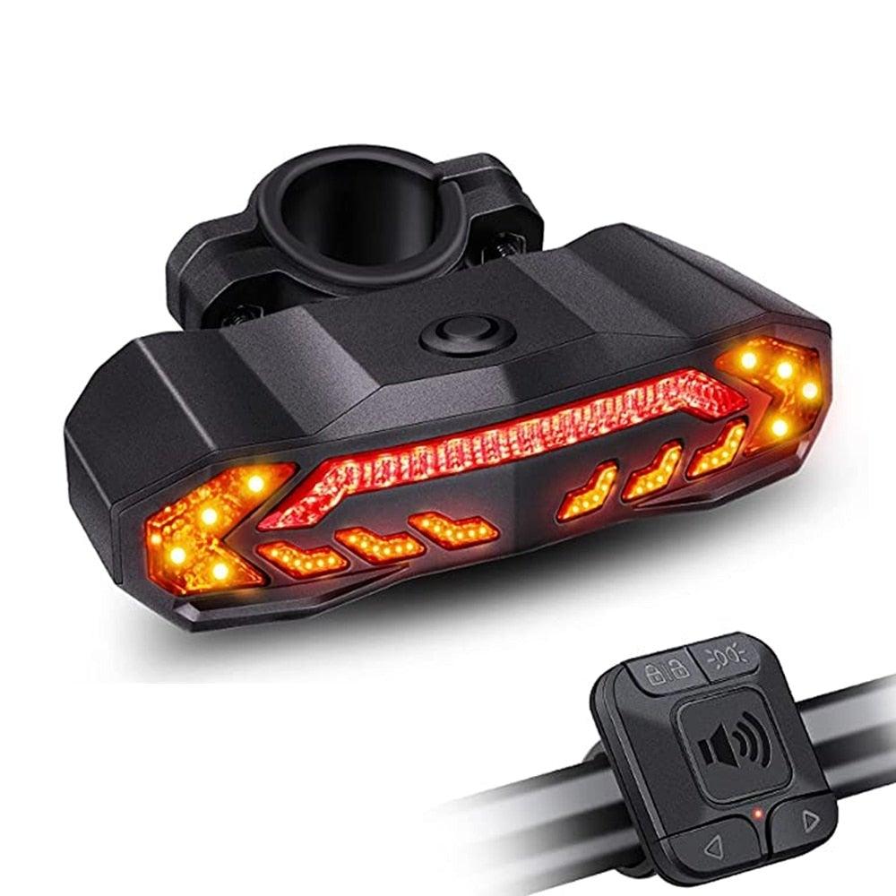 Stevvex anti-theft bike alarm taillight with wireless remote and turn signal functionality mounted on a bicycle.