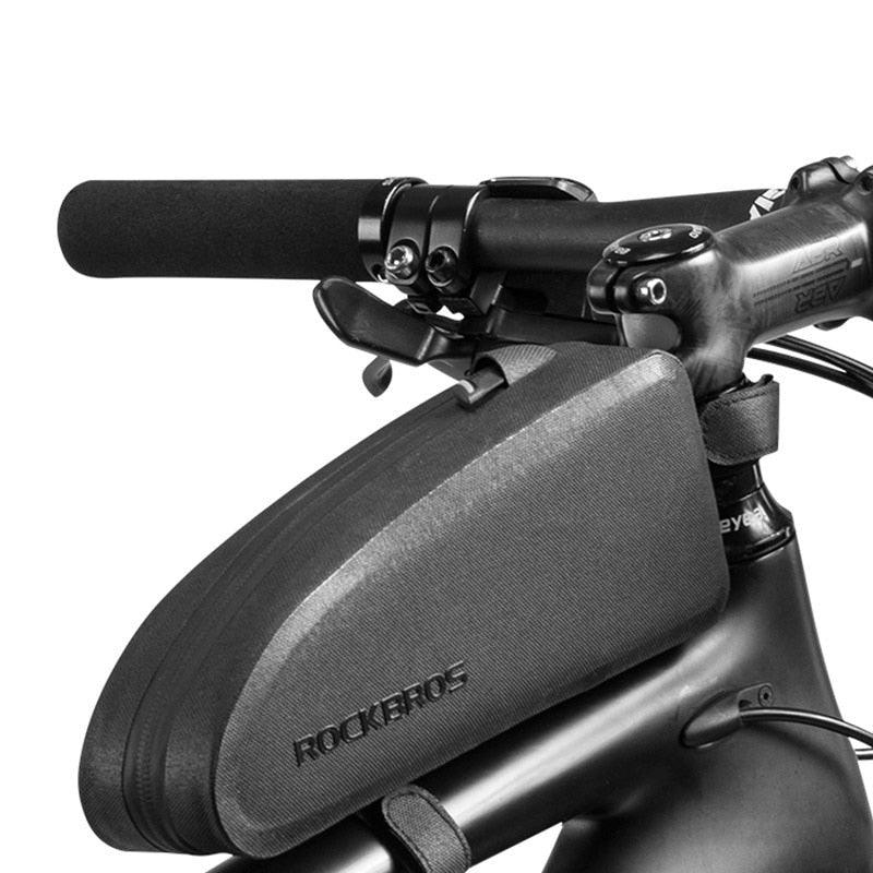 Black waterproof bicycle top tube frame bag attached to a road bike
