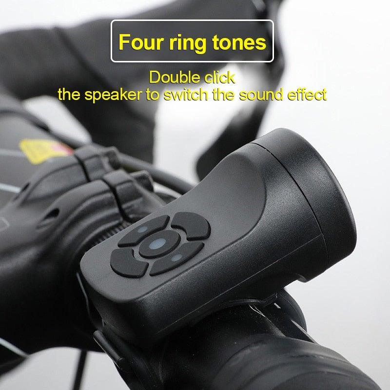 Stevvex electric bicycle horn mounted on handlebars with USB charging port visible.
