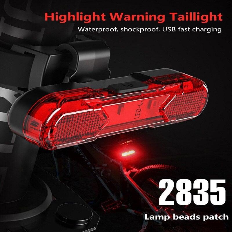Rechargeable waterproof bicycle tail light available in black, blue, red, and white