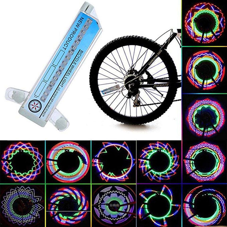 Stevvex LED bicycle wheel rim lights displaying vibrant patterns on a bike tire.