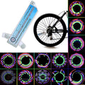 Stevvex LED bicycle wheel rim lights displaying vibrant patterns on a bike tire.
