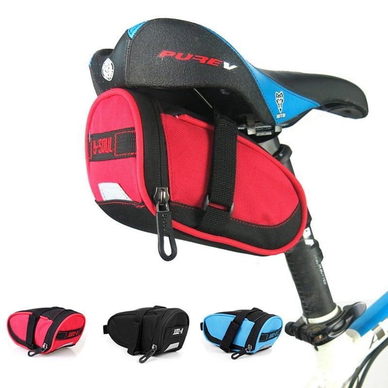 Waterproof bike saddle bag under a bicycle seat with reflective safety loop