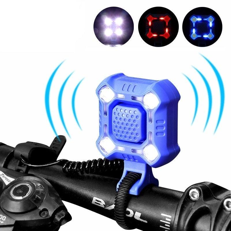 Stevvex 4-Lamp bicycle headlight with integrated electric horn mounted on a handlebar.