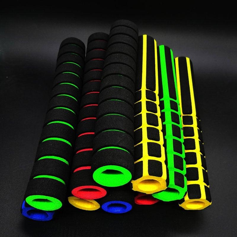 Close up of long length soft sponge mountain bike handlebar grips with aluminum lock-on