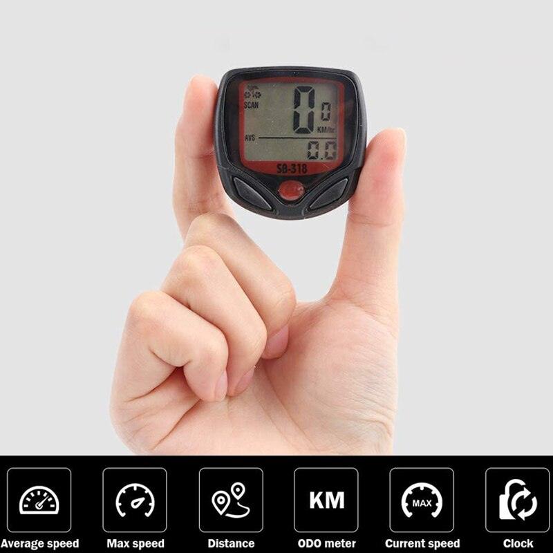 Waterproof wired bike speedometer with backlit LCD display attached to bicycle handlebars