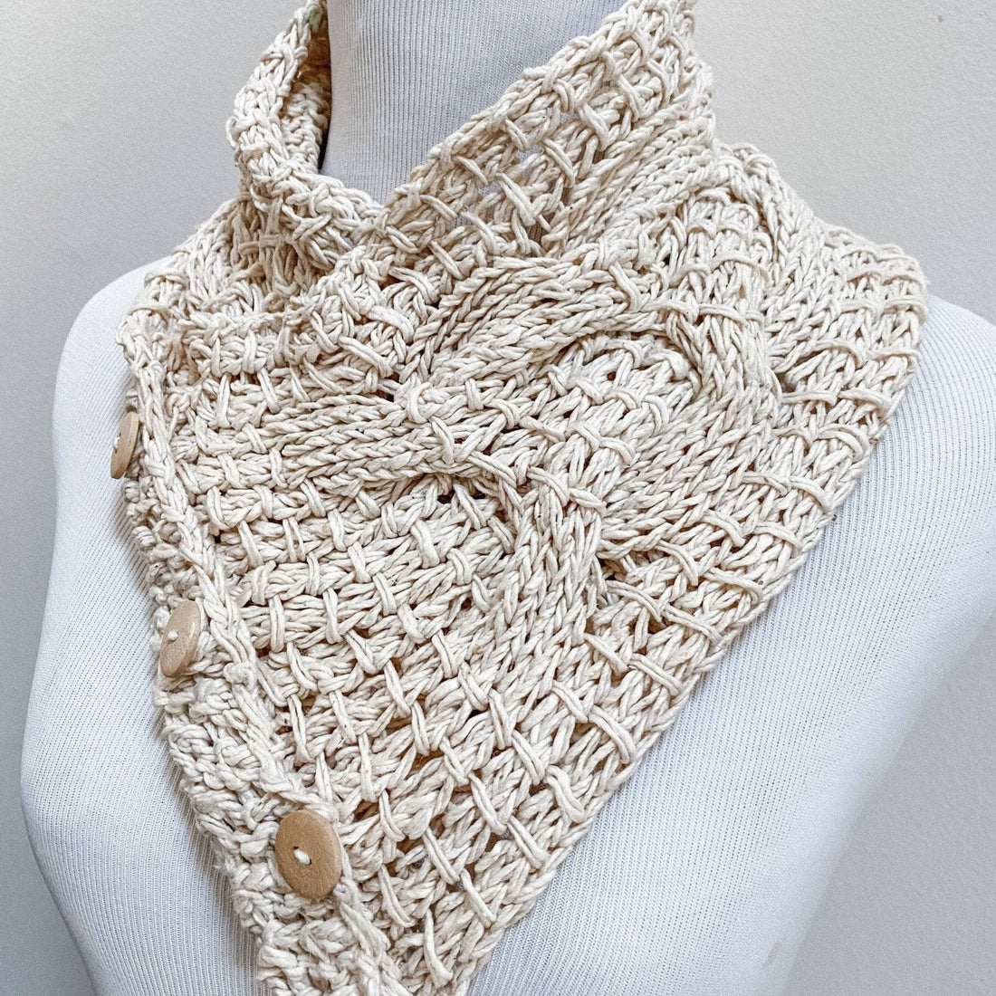 Birch Tree Cowl knitting project with beige multi-color texture and button closure