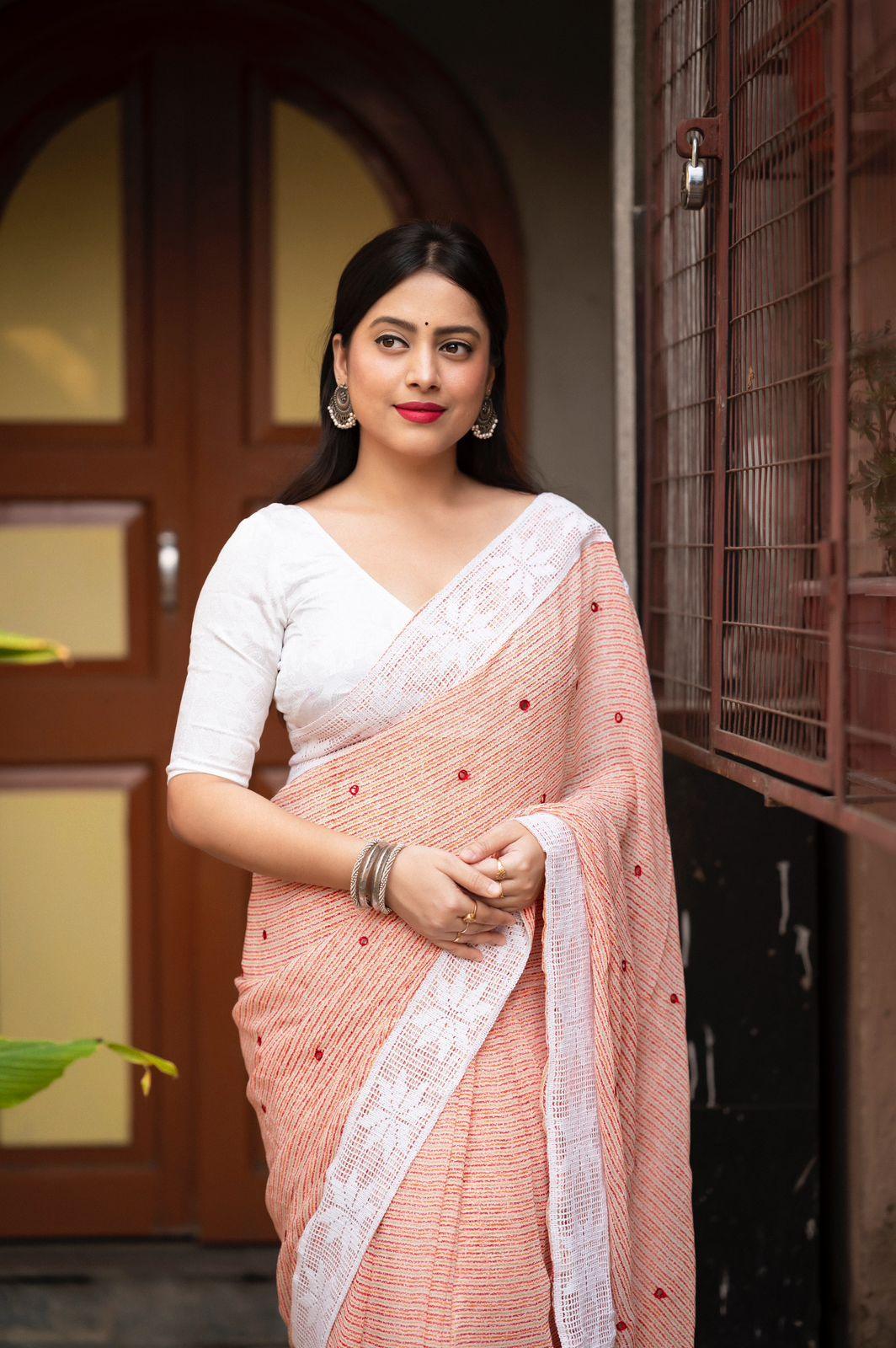 Peach Poly Georgette Saree with Aari Mirror Border