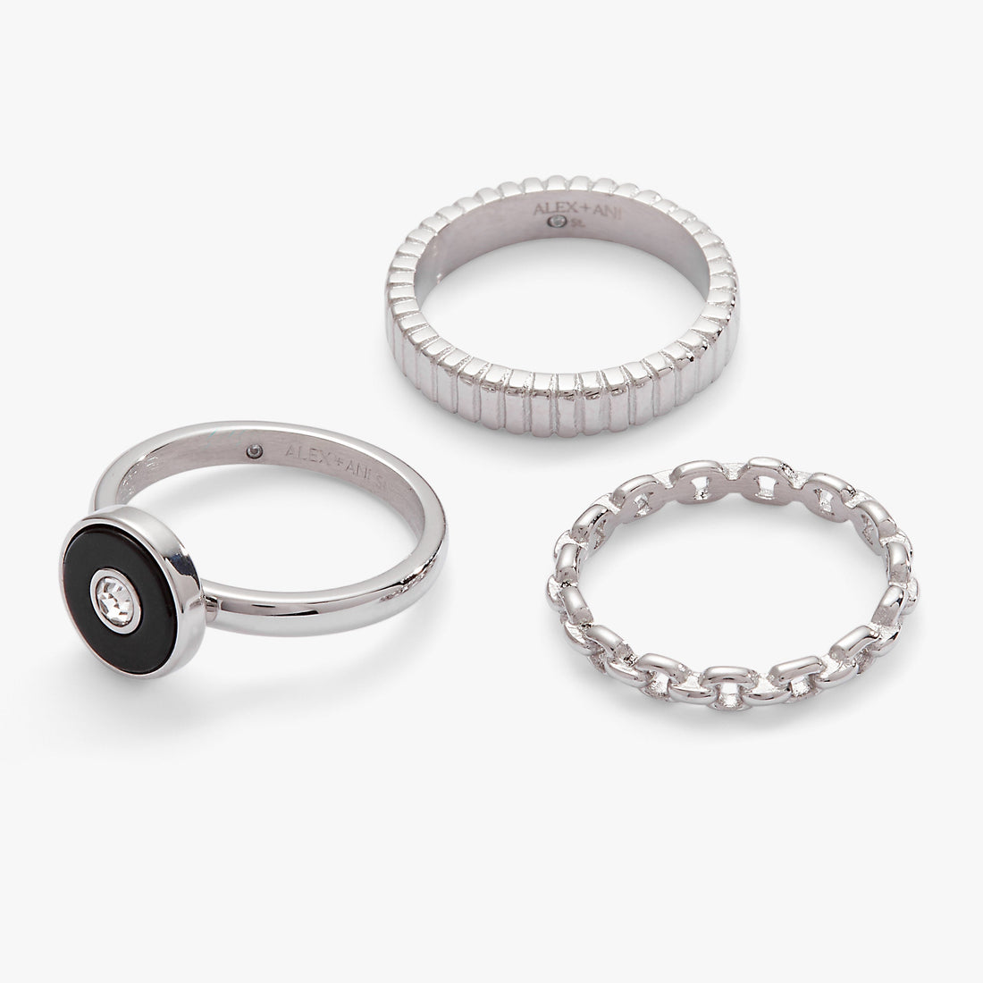 Three-piece ring set featuring a black onyx and clear crystal statement ring with two textured silver stacking bands