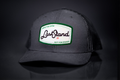 Last Stand Golf curved bill trucker hat with Drive for Show graphic