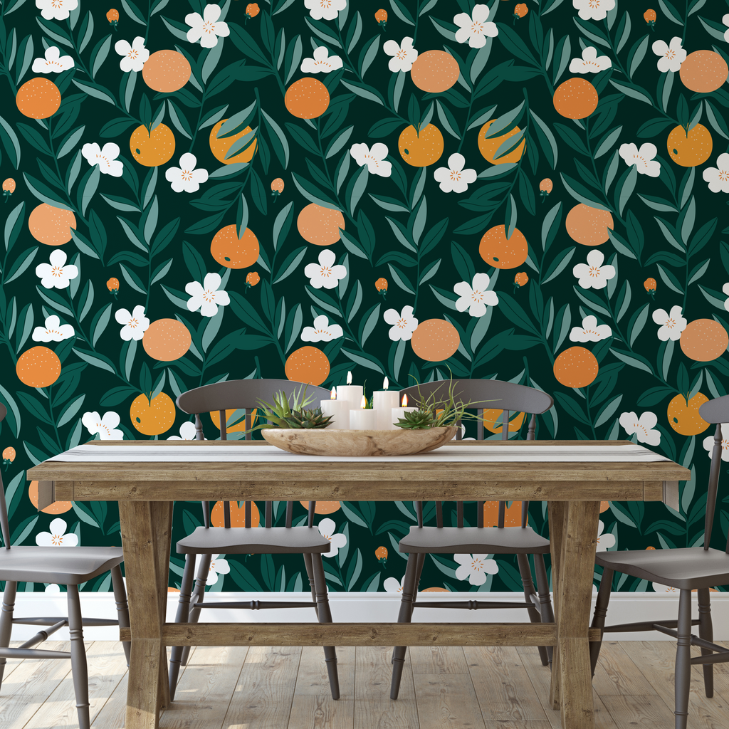 Close up of Talia floral wallpaper with orange, green, and cream botanical print