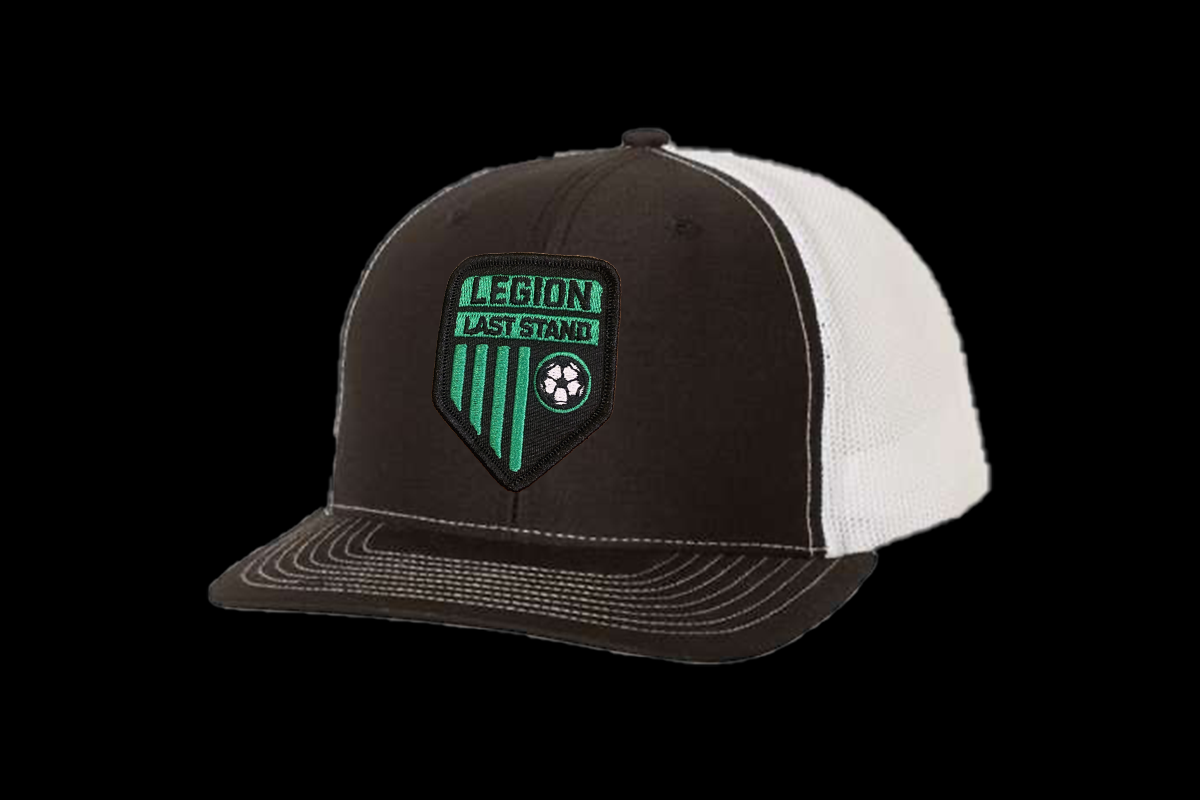 Front view of the Legion Shield curved bill mesh snapback hat in a neutral tone.