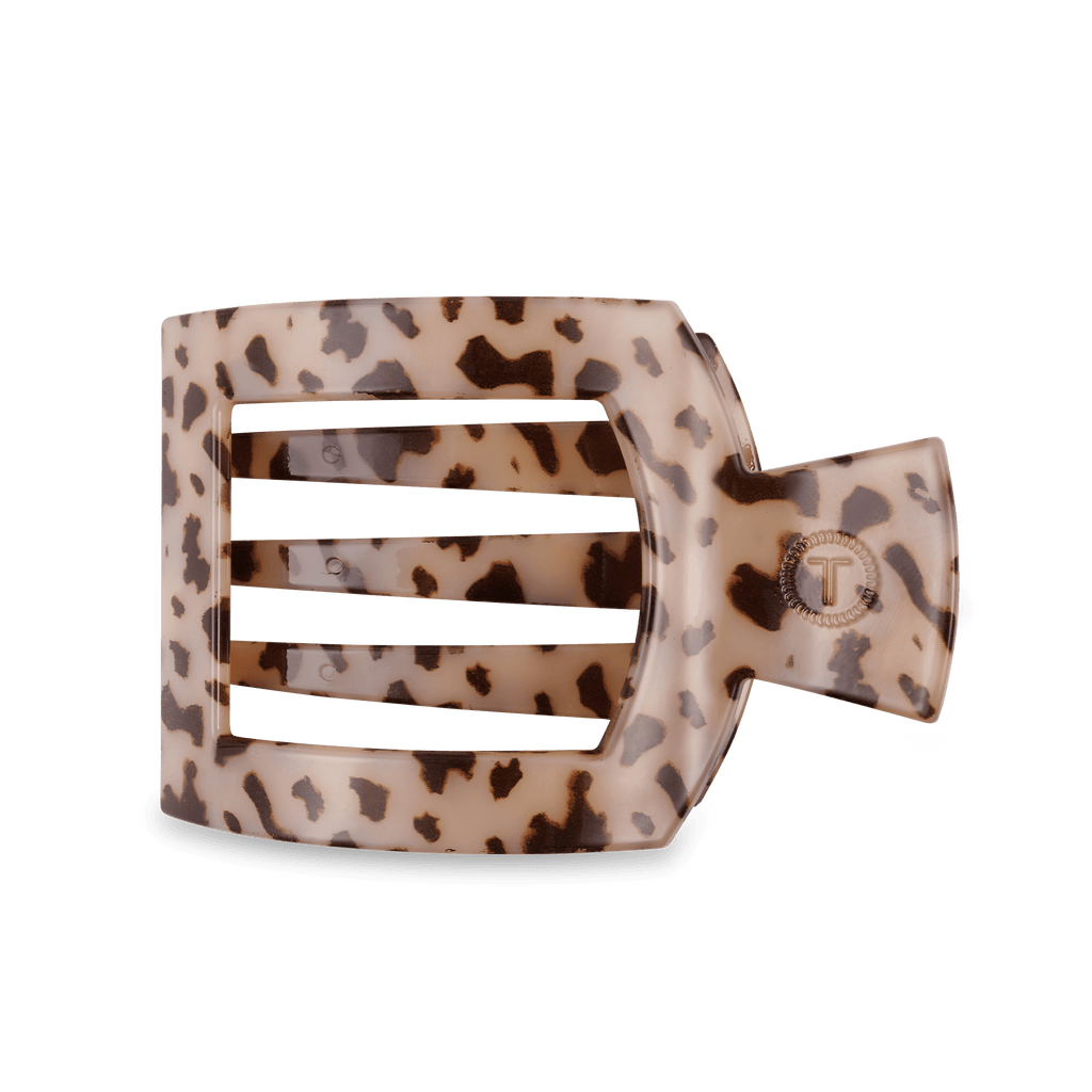 Blonde Tortoise Large Flat Square Hair Clip laying on a flat surface