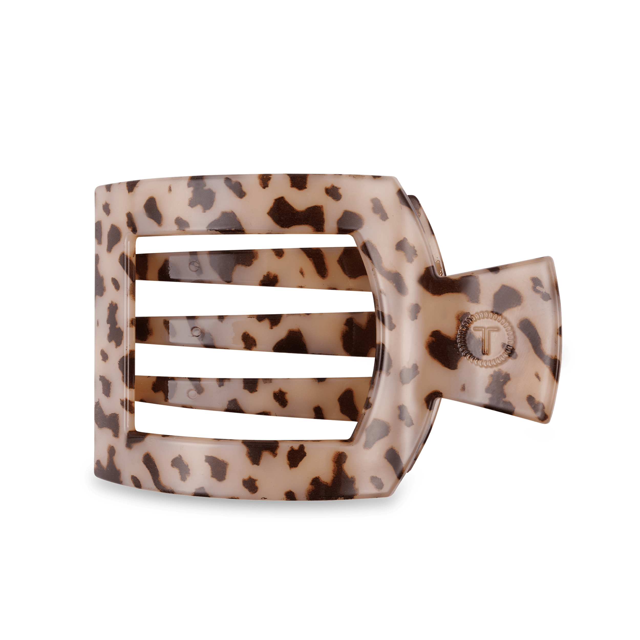 Blonde Tortoise Large Flat Square Hair Clip laying on a flat surface