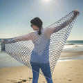 Blue Jay Lattice Shawl crochet pattern featuring ombre lattice detail styled as a spring scarf