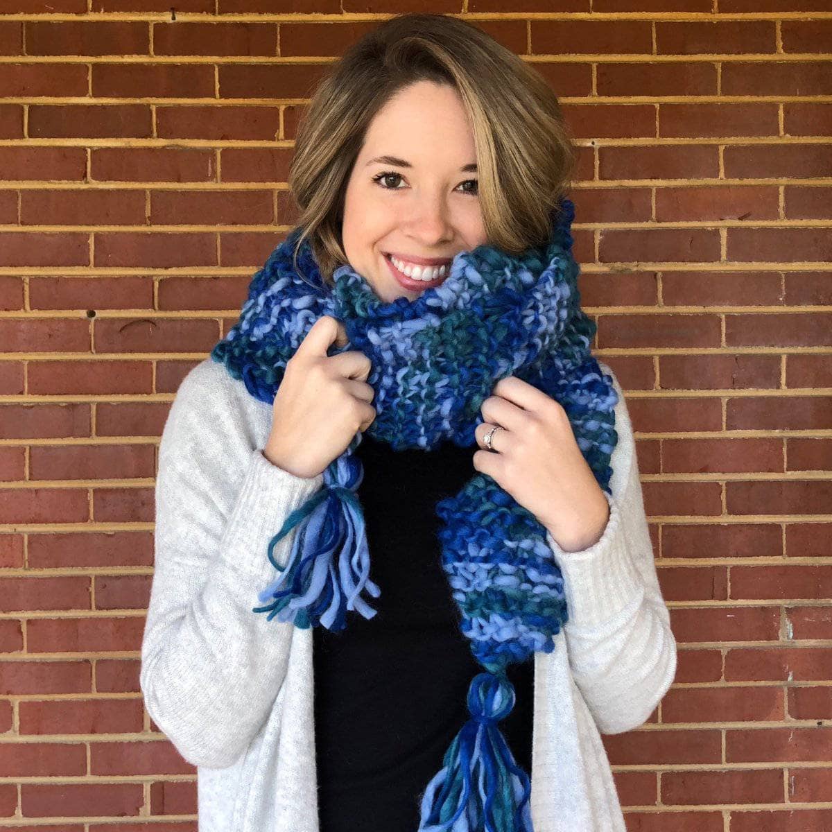 Close up of a textural handmade Blue Ridge Blanket Scarf knitting project.