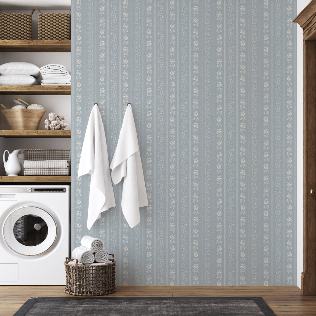 Elaine striped wallpaper in dusty blue and cream featuring a cottagecore aesthetic
